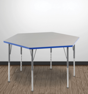 Hexagonal shaped table with grey laminate top and blue edge banding, grey frame in a room with rendered wood floors and white walls.