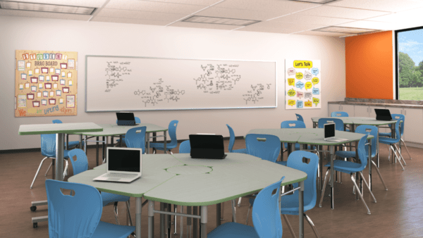 Glacier Idea Desk Classroom with center pedestals and chairs. Pictured in groups of 5 in a classroom setting.