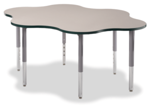 Cloud shaped table that seats six people. Grey laminate top, navy edge banding and grey frame.