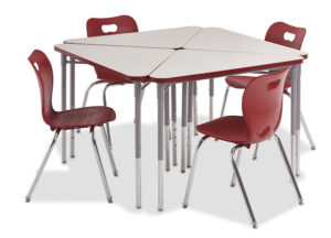 Isosceles Triangle shaped desks in a group of four making a square. Pictured with four red chairs on a white background